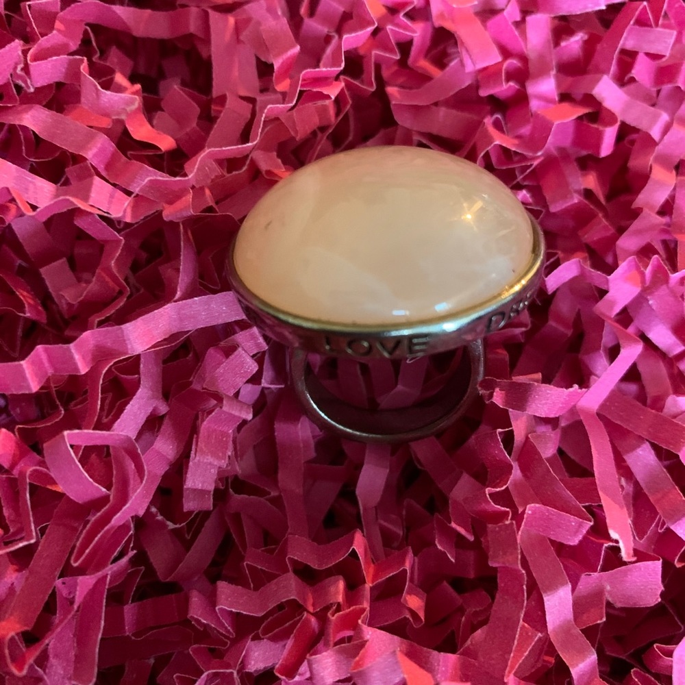 Silver Ring with a love peace a peach  on top